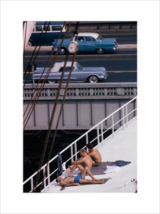 Sunbathers on a bridge, USA