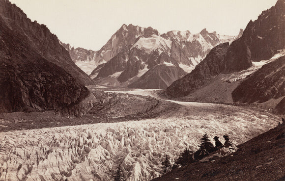 Walkers resting beside a glacier, French Alps, c 1870s.