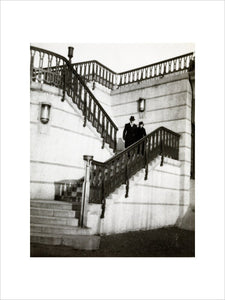 Couple walking down steps