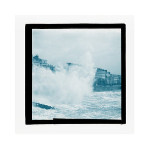 A magic lantern slide of sea waves crashing against the shore by Birt Acres, c. 1893.