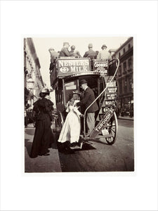 Boarding a bus, about 1900