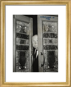 Alfred Hitchcock at the doors of Coronation Street's Rovers Return