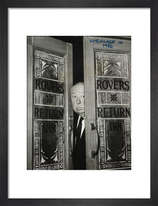 Alfred Hitchcock at the doors of Coronation Street's Rovers Return