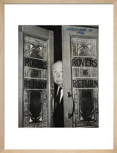 Alfred Hitchcock at the doors of Coronation Street's Rovers Return
