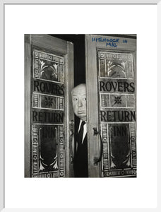 Alfred Hitchcock at the doors of Coronation Street's Rovers Return