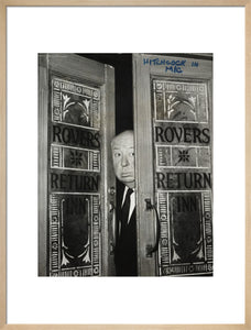 Alfred Hitchcock at the doors of Coronation Street's Rovers Return