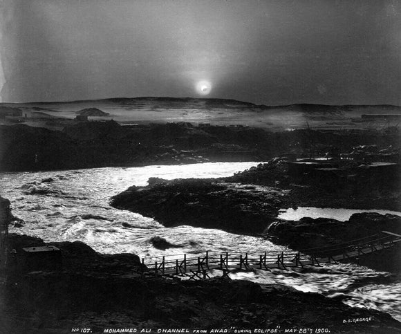 Eclipse of the sun over the old Aswan Dam, Egypt, 28 May, 1900.