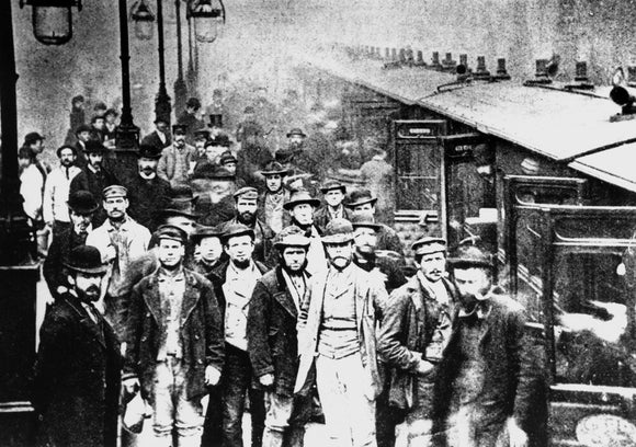 Workmen waiting at Liverpool Street Station, 25 October 1884.