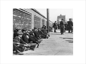 Miners resting at Central Station, Blackpool, 21 June 1919.