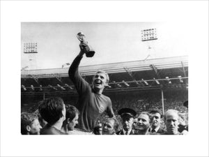 Bobby Moore holding the World Cup, Wembley, 1966.