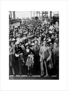 Crowds waiting to board trains for their holidays, Waterloo station, 26 July 1936.