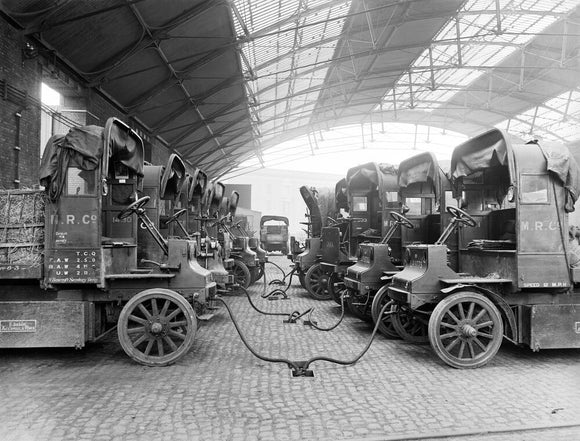Lorries being refuelled at St Pancras goods depot, London, 11 July 1917.