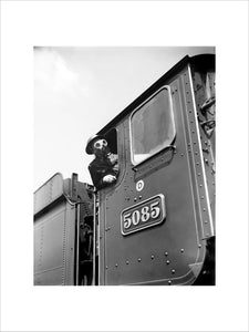 Train driver with a gas mask, World War Two, 21 August 1940.