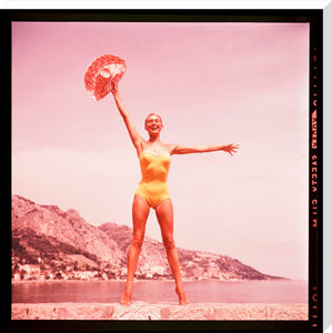 Woman in a yellow swimsuit, 1960s.