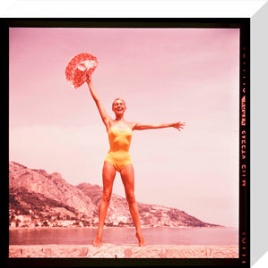 Woman in a yellow swimsuit, 1960s.