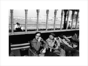 Three elderly males relaxing in chairs, 1968.