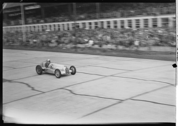 Luigi Fagioli in a Mercedes-Benz racing car, Nurburgring, 1930s.