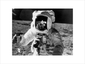 Astronaut Alan Bean with camera during Apollo 12 Lunar mission, November 1969.