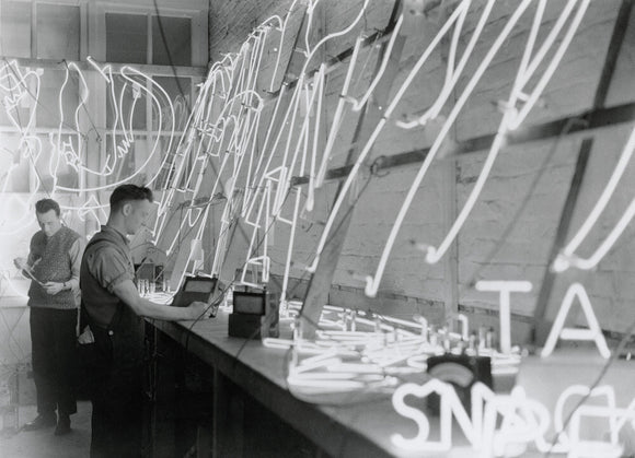 Working on neon tube signs, February 1933.