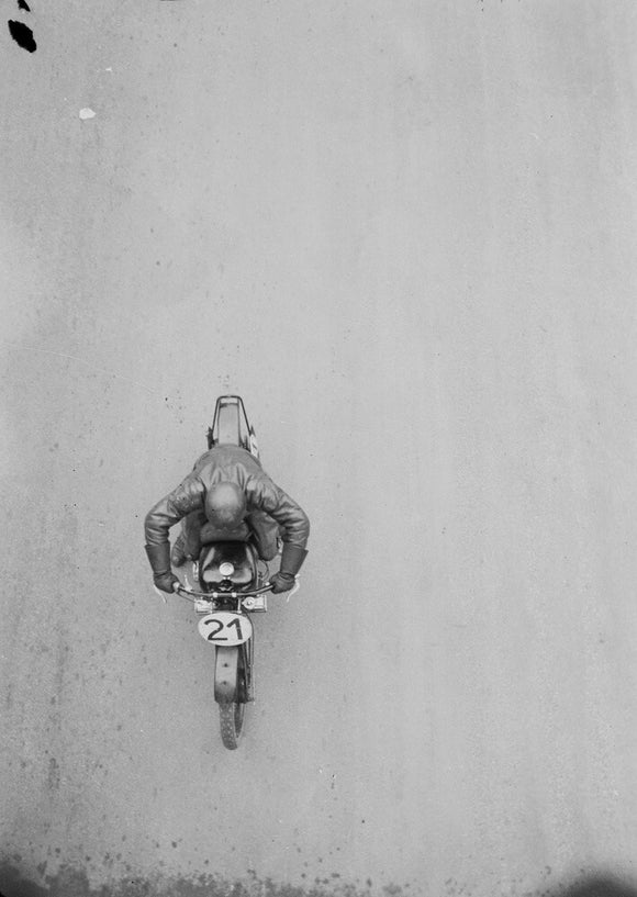 Aerial view of motorcycle no. 21. Photographed by Zoltan Glass, c.1930.
