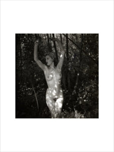 Naked woman in woods