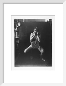 Photograph entitled 'Self Portrait with Mill Stone'