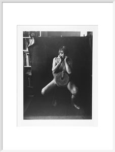 Photograph entitled 'Self Portrait with Mill Stone'
