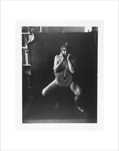 Photograph entitled 'Self Portrait with Mill Stone'