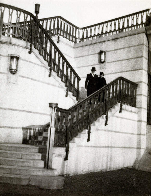 Couple walking down steps