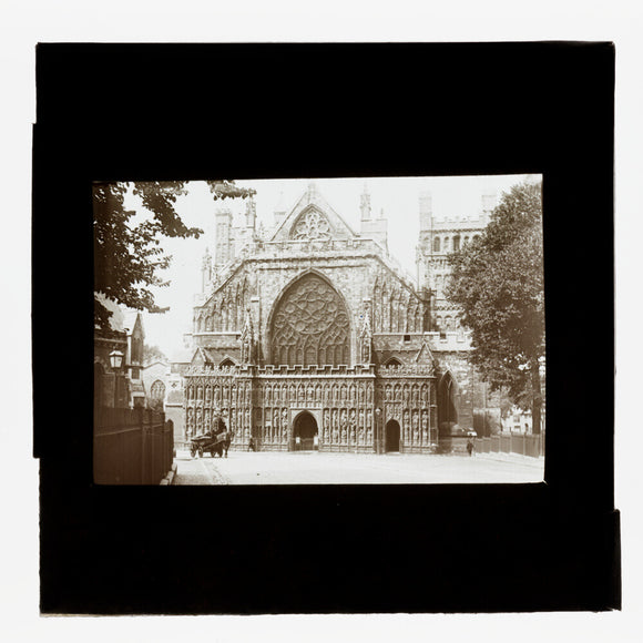 A magic lantern slide showing the west front of Exeter Cathdral by Birt Acres, c. 1893.