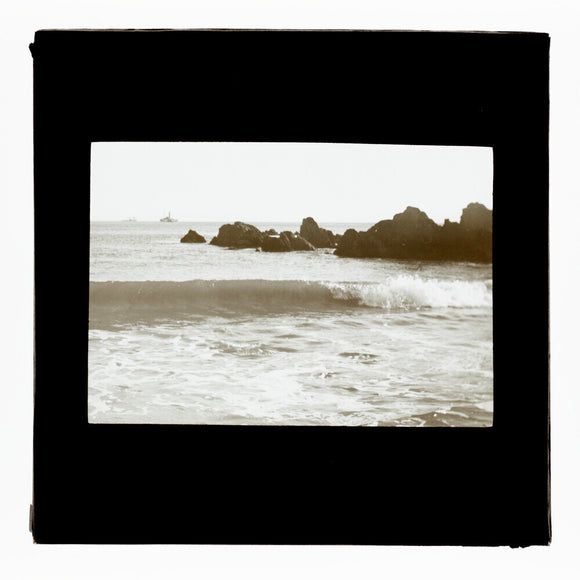 A magic lantern slide entitled 'As The Flowing Tide Comes In' by Birt Acres, c. 1893.